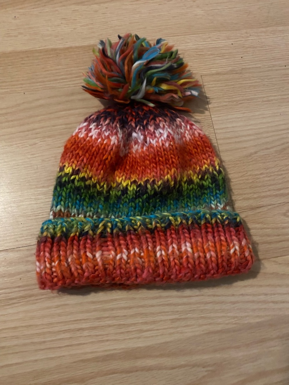 Womens Multicolor Knit Pom Beanie - Bright Orange & Rainbow